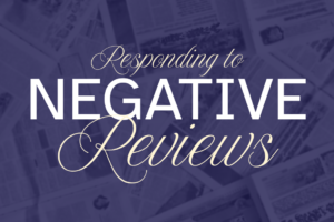 Responding to Negative Reviews is written on a blue background of papers.